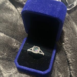 Cushion Cut Silver Ring with Iridescent Stone